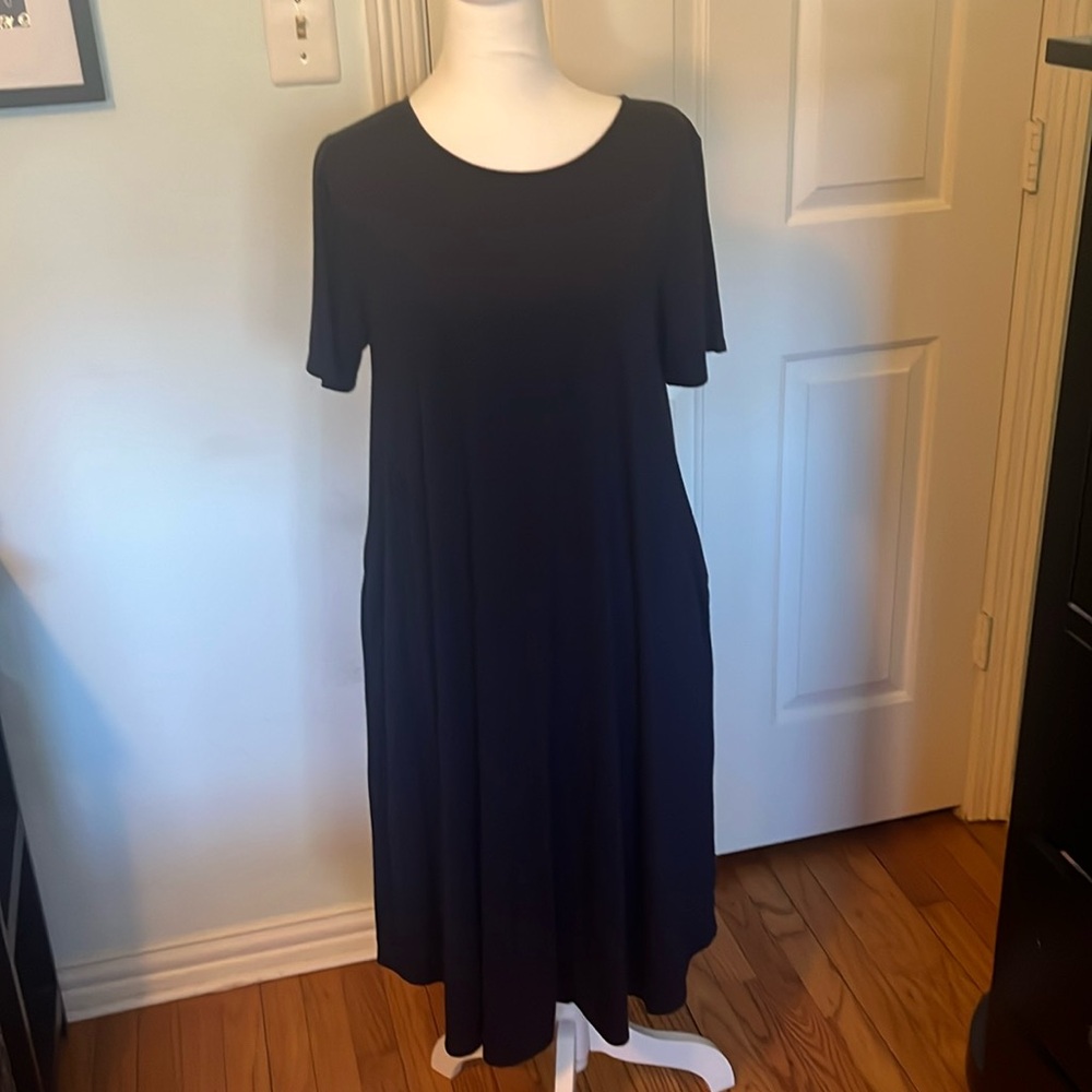 Zenana outfitters soft dress with side slit pockets.